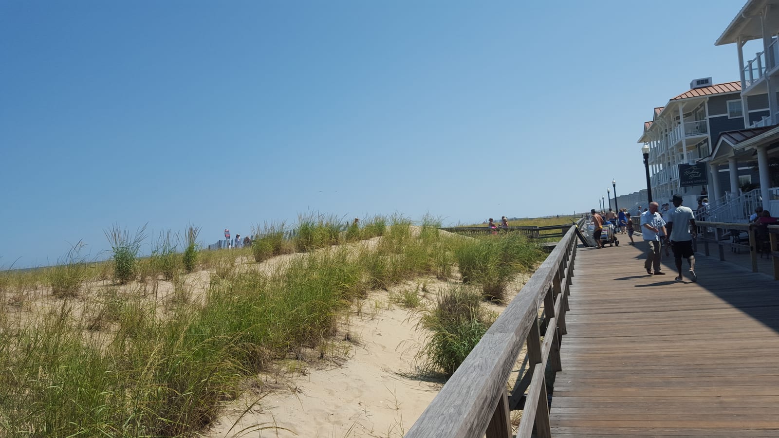 Dunes and boardwalk at Bethany Beach, Delaware, looking along the beach grass toward the ocean