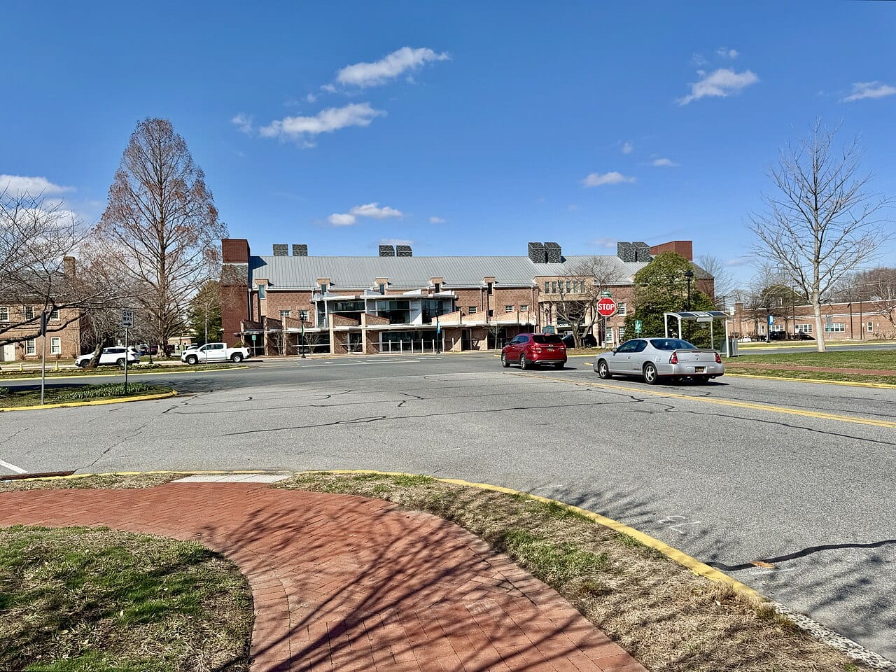Built in 2012, this Postmodern-style building was designed by Becker Morgan Group to serve as a public library for the city of Dover. The building is clad in red brick with metal t